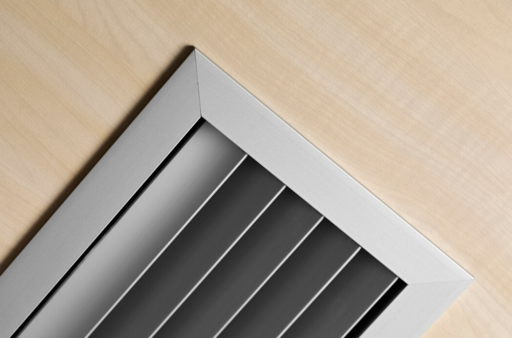 Close up on ventilation system on wooden ceiling