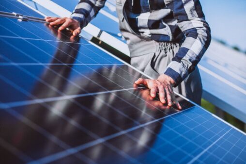 Close up of man work with the solar panels