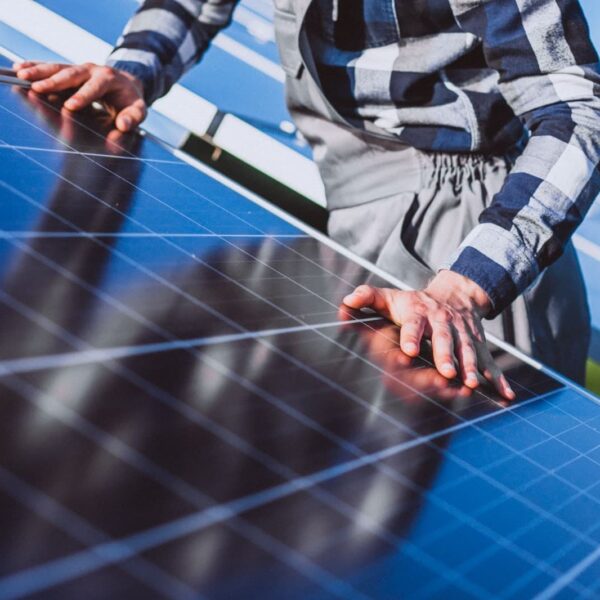 Close up of man work with the solar panels