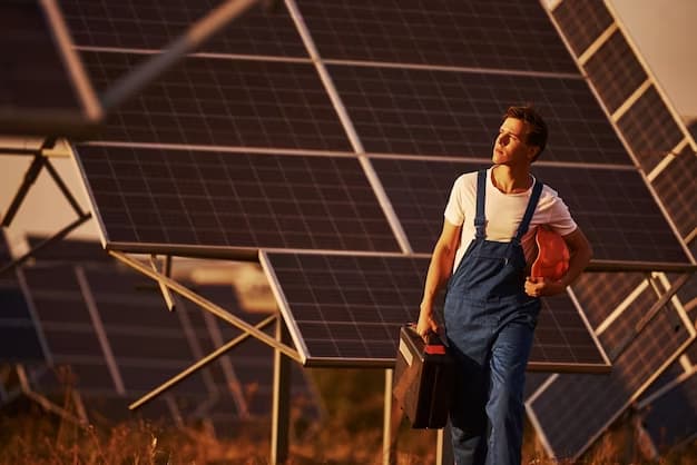 A man is installing solar panels