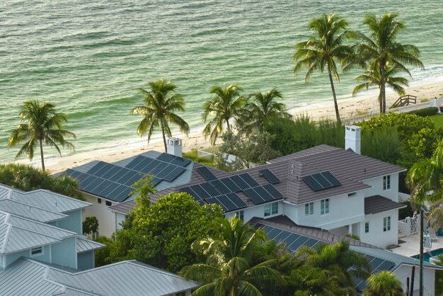 Aerial view of the roof of an expensive American building with blue solar panels